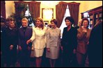 Laura Bush stands between the First Lady of Poland Jolenta Kwasneiska, third right, and First Lady of the Czech Republic , Dagmar Havlova, third left, as other spouses to NATO heads of state line up for a photo-op prior to a luncheon hosted by Dagmar Havlova at a Presidential retreat outside Prague. White House photo by Susan Sterner.