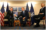 Secretary General of NATO Lord Robertson and President George W. Bush meet for a bilateral meeting in Prague, Czech Republic, Wednesday, Nov. 20.