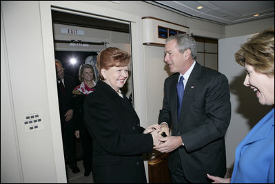 President and Mrs. Bush are greeted aboard Air Force One by Latvian President Vaira Vike-Freiberga after they arrived Friday, May 6, 2005, in Riga. The President and Mrs. Bush are on a four-day visit to Europe that will include stops in Latvia, the Netherlands, Georgia and Russia.