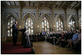 Delivering an address during the 60th anniversary week of WWII, President George W. Bush tells the story of Latvian sailors on eight freighters who disobeyed orders from a puppet government and remained at sea to help the U.S. Merchant Marines during the war at The Small Guild Hall in Riga, Latvia, Saturday, May 7, 2005. “By the end of the war, six of the Latvian ships had been sunk, and more than half the sailors had been lost,” said President Bush. “Nearly all of the survivors settled in America, and became citizens we were proud to call our own.”