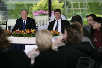 President George W. Bush and Prime Minister Jan Peter Balkenende of The Netherlands, smile as they answer questions during a youth roundtable Sunday, May 8, 2005, in Valkenburg, Netherlands.