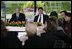 President George W. Bush and Prime Minister Jan Peter Balkenende of The Netherlands, smile as they answer questions during a youth roundtable Sunday, May 8, 2005, in Valkenburg, Netherlands.