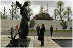 First Lady Laura Bush reflects after placing flowers at the Mourning Woman Statue in Netherlands American Cemetery Sunday, May 8, 2005, in Margraten.
