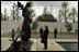 First Lady Laura Bush reflects after placing flowers at the Mourning Woman Statue in Netherlands American Cemetery Sunday, May 8, 2005, in Margraten.
