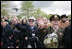 World War II veterans acknowledge President and Mrs. Bush Sunday, May 8, 2005, during a celebration at the Netherlands American Cemetery in Margraten, in remembrance of those who served during World War II.