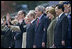 President George W. Bush and Laura Bush stand with Russian President Vladimir Putin and Ludmila Putina, French President Jacque Chirac, far left, and Chinese President Hu Jintao, right, as many heads of state watch a parade in Moscow's Red Square commemorating the end of World War II Monday, May 9, 2005.