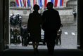 President George W. Bush and Laura Bush arrive at the Kremlin to take part in ceremonies commemorating the 60th anniversary of the end of World War II in Moscow's Red Square Monday, May 9, 2005.