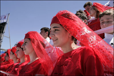 Georgian children in traditional dress join thousands of people gathered in Freedom Square to hear President Bush speak the President's in Tbilisi, Georgia, Tuesday, May 10, 2005. 