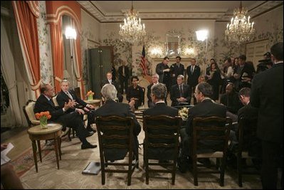Attending a bilateral meeting, Presidents George W. Bush and Jacques Chirac of France address the press at the Ambassador's Residence, Brussels, Belgium, Monday, Feb. 21, 2005.