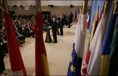 President George W. Bush and NATO Secretary General Jaap de Hoop Scheffer take questions during a news conference Tuesday, Feb. 22, 2005, at NATO Headquarters in Brussels. 