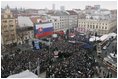 President George W. Bush and Slovakia.s Prime Minister Mikulas Dzurinda are greeted by a crowd of thousands gathered in Bratislava's Hviezdoslavovo Square, February 24, 2005. 