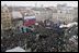 President George W. Bush and Slovakia.s Prime Minister Mikulas Dzurinda are greeted by a crowd of thousands gathered in Bratislava's Hviezdoslavovo Square, February 24, 2005. 