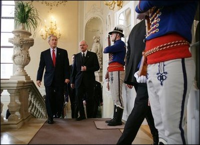 During his visit to the Presidential Palace in Bratislava, President George W. Bush walks with Slovak President Ivan Ivan Gasparovic Thursday, February 24, 2005.