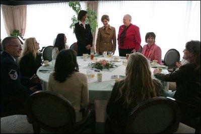 Mrs. Bush talks with spouses of deployed military during a luncheon Tuesday, Feb. 22, 2005, at Ramstein Air Base in Ramstein, Germany.