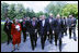 President George W. Bush, center, walks with a delegation of European Union leaders, Tuesday, June 10, 2008 at Brdo Castle in Kranj, Slovenia. From left are, Benita Ferrero-Waldner, commissioner for External Relations and European Neighborhood Policy; European Commission President Jose Manuel Barroso; Slovenia Prime Minister Janez Jansa; and Dimitrij Rupel, Slovenia Minister for Foreign Affairs, background right.