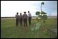 Guided by the National Park Service Officers, President George W. Bush, far left, and Governor Jeb Bush, far right, survey the landscape at Everglades National Park, Fla., June 4, 2001. White House photo by Eric Draper.