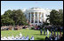 President George W. Bush and Mrs. Laura Bush welcome President John Agyekum Kufuor and Mrs. Theresa Kufuor of Ghana Monday, Sept. 15, 2008, during the South Lawn Arrival Ceremony for President Kufuor and Mrs. Kufuor of Ghana on the South Lawn of the White House.