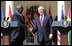 President George W. Bush shakes hands with President John Agyekum Kufuor of Ghana following a joint statement Monday, Sept. 15, 2008, in the Rose Garden of the White House.