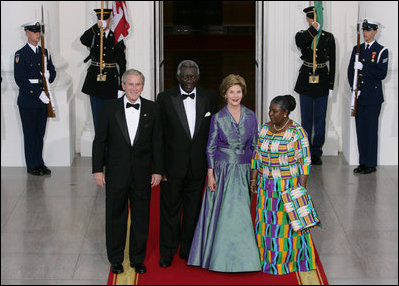 President George W. Bush and Mrs. Laura Bush welcome President John Agyekum Kufuor and Mrs. Theresa Kufuor of Ghana Monday, Sept. 15, 2008, upon their arrival to the North Portico of the White House for a State Dinner in their honor.