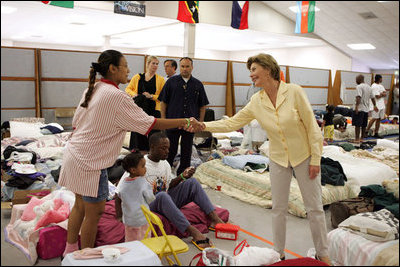 Laura Bush visits people affected by Hurricane Katrina at the Bethany World Prayer Center shelter, Monday, Sept. 5, 2005 in Baton Rouge, La., where hundreds of people have taken refuge.