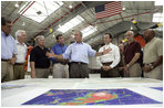 President George W. Bush talks about Hurricane Katrina disaster relief with, from left: Senator Trent Lott, R-Miss.; Senator Thad Cochran, R-Miss.; Mississippi Governor Haley Barbour; Alabama Governor Bob Riley; FEMA Director Mike Brown; Michael Chertoff, Secretary of Homeland Security, and Alphonso Jackson, Secretary of Housing and Urban Development. The President briefed the officials during his tour Friday, Sept. 2, 2005, of the Gulf Coast regions hard hit by the storm. 