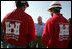 Vice President Dick Cheney speaks with members of the US Army Corps of Engineers personnel while taking a tour of the 17th Street levee repair operations in New Orleans, Louisiana Thursday, September 8, 2005.