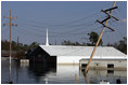 A church in New Orleans, Louisiana is submerged by floodwaters that were caused by the effects of Hurricane Katrina Thursday, September 8, 2005. The hurricane hit both Louisiana and Mississippi on August 29th.