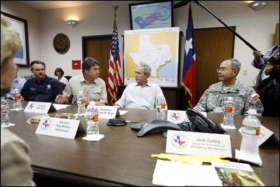 President George W. Bush is joined by FEMA Administrator Secretary David Paulison, left, Texas Governor Rick Perry and Texas National Guard Lt. General Charles Rodriguez, right, during a briefing Monday, Sept. 1, 2008 at the Texas Emergency Operations Center in Austin, Texas, for the most recent update on Hurricane Gustav.