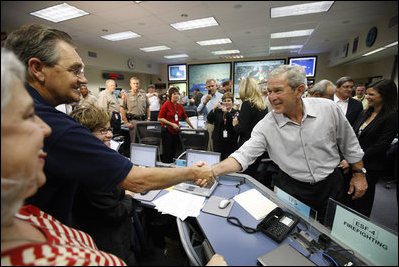 President George W. Bush greets and thanks personnel at the Emergency Operations Center in Austin, Texas, Monday, Sept. 1, 2008, following a briefing update on Hurricane Gustav.