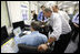 President George W. Bush is shown a computer tracking the latest position of Hurricane Gustav during a briefing Monday, Sept. 1, 2008 at the Texas Emergency Operations Center in Austin, Texas.