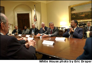 President George W. Bush meets with the President's Commission to Strengthen Social Security in the Roosevelt Room Jan. 18, 2002. Seated with the President are, from left to right, William Frenzel (far left), Mario Rodriguez, Gwendolyn King, Dr. John Cogan, Commission Co-chair Sen. Patrick Moynihan, Co-chair Richard D. Parsons and Deputy Chief of Staff Josh Bolton.