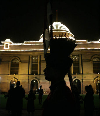 An honor guard stands outside Rashtrapati Bhavan, the presidential residence, in New Delhi, shortly after the arrival Thursday, March 2, 2006, of President George W. Bush and Laura Bush for the evening's State Dinner.