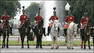 A Pakistan cavalry honor guard welcomes President George W. Bush to Aiwan-e-Sadr in Islamabad, Pakistan, Saturday, March 4, 2006.