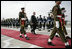 President George W. Bush is escorted by an honor guard as he reviews Pakistan troops at his official welcome to Aiwan-e-Sadr in Islamabad, Pakistan, Saturday, March 4, 2006.