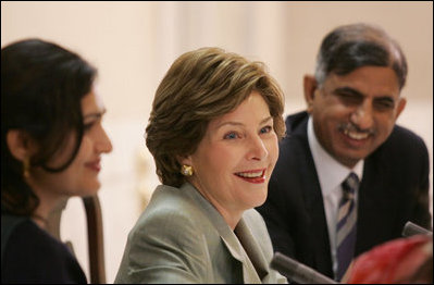 Mrs. Laura Bush addresses a roundtable discussion during an Education Through Partnerships meeting with representatives from USAID, UNESCO & CRI at library at the U.S. Embassy , Saturday, March 4, 2006 in Islamabad, Pakistan.