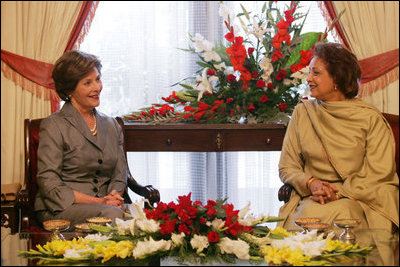 Mrs. Laura Bush speaks with Mrs. Sehba Musharraf, wife of President Pervez Musharraf, during their meeting at Aiwan-e-Sadr, Saturday, March 4, 2006 in Islamabad, Pakistan.