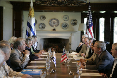 President George W. Bush sits across from Uruguay’s President Tabare Vazquez during a morning meeting at Estancia Anchorena in Colonia. Among the many topics the parties discussed were education and international trade. White House photo by Eric Draper