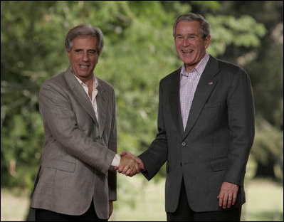 President George W. Bush and President Tabare Vazquez of Uruguay, exchange handshakes Saturday, March 10, 2007, after joint press availability at Estancia Anchorena, where President Bush pledged to work hard for a compassionate and rational immigration law. White House photo by Paul Morse