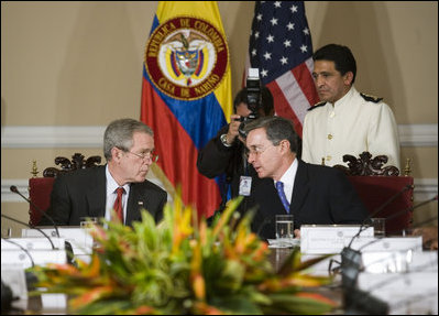 President George W. Bush and President Alvaro Uribe of Colombia participate in an Afro-Colombian Outreach program during President Bush’s visit Sunday, March 11, 2007. White House photo by Eric Draper