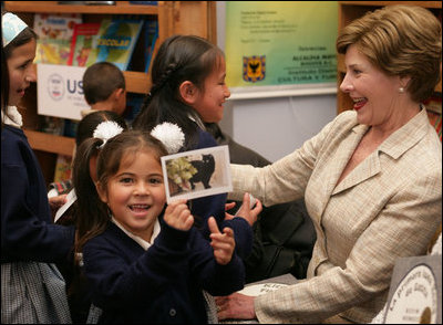 Mrs. Laura Bush greets students at the Rafael Pombo Foundation, a reading center named for the 19th Century poet, during her visit Sunday, March 11, 2007 in Bogota, Colombia. White House photo by Shealah Craighead