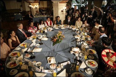 President George W. Bush is joined by recipients of training, internships, exchanges and scholarships (TIES) for breakfast Wednesday, March 14, 2007, at the Hyatt Regency Merida in Merida, Mexico. White House photo by Eric Draper