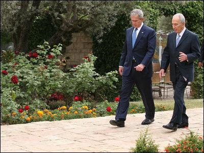 President George W. Bush and President Shimon Peres of Israel walk during their visit Wednesday, May 14, 2008, at the Jerusalem residence of President Peres.