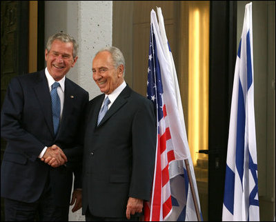 President George W. Bush and President Shimon Peres of Israel pause for photographers as they meet Wednesday, May 14, 2008, at President Peres' Jerusalem residence.