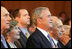 President George W. Bush and Laura Bush are seen with Israeli leaders Prime Minister Ehud Olmert, left, and Israeli President Shimon Peres during the playing of the National Anthem Wednesday, May 14, 2008 in Jerusalem, during a celebration of Israel's 60th anniversary as a nation at the Israeli Presidential Conference 2008 at the Jerusalem International Convention Center.