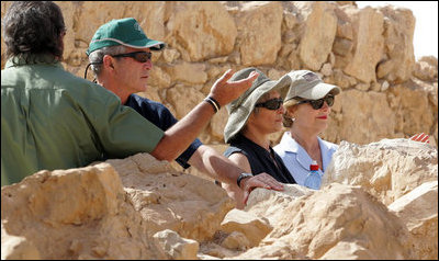 President George W. Bush and Mrs. Laura Bush stand with Mrs. Aliza Olmert, spouse of Israeli Prime Minister Ehud Olmert, as they listen to Eitan Campbell, Director of the Masada National Park, during a visit to the historic site Thursday, May 15, 2008, in Masada, Israel.