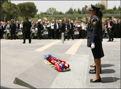 President George W. Bush participates in a wreath-laying ceremony during his visit Thursday, May 15, 2008, to the Knesset in Jerusalem.
