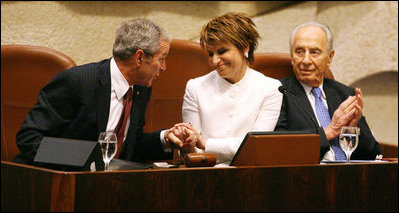President George W. Bush acknowledges Dalia Itzik, Speaker of the Knesset, as he visits the Israeli parliament Thursday, May 15, 2008, in Jerusalem. At right is Israel's President Shimon Peres.