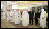 President George W. Bush and Mrs. Laura Bush are greetedPresident George W. Bush and King Abdullah bin Abdulaziz review the troops during the arrival ceremonies Friday, May 16, 2008, for the President and Mrs. Laura Bush in Riyadh. by the Saudi delegation as they stand with King Abdullah bin Abdulaziz during arrival ceremonies Friday, May 16, 2008, at Riyadh-King Khaled International Airport in Riyadh.