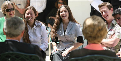 Participants in a roundtable discussion with President George W. Bush and Mrs. Laura Bush break out in laughter Friday, May 16, 2008, in the garden of the Bible Lands Museum Jerusalem. A dozen young leaders interested in foster peace in their country, their discussion included the topics of peace, democracy and misperceptions.