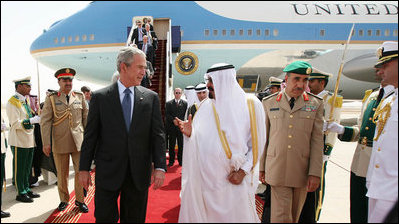 President George W. Bush and King Abdullah bin Abdulaziz walk the red carpet after the arrival Friday, May 16, 2008, of the President and Mrs. Laura Bush to Riyadh. As guests of the King, the President and Mrs. Bush will overnight at his Al Janadriyah Ranch before continuing on their Mideast Visit Saturday to Egypt.